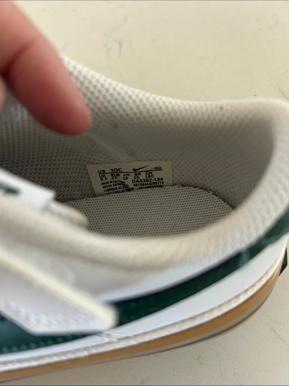 Nike Kids White Sneakers with Green Swoosh and Gum Sole